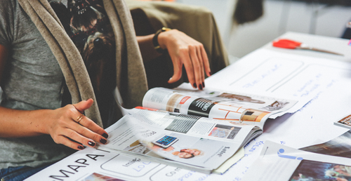 magazine editor reviewing an article layout