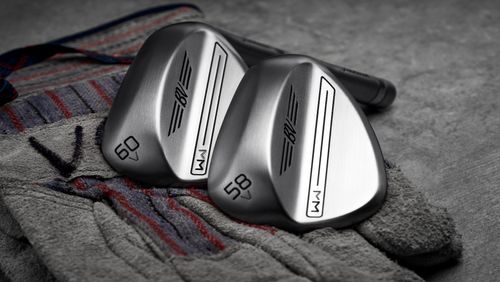 K* Grind wedge with a raw finish, featuring heel-to-toe relief and a narrow ribbon of added bounce along the leading edge.