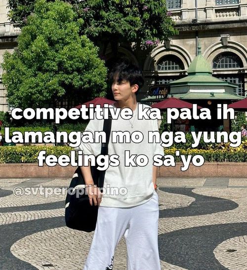 a young man walking down the street with his hand in his pocket and text reading competitive ka paa hi lamaang mo ngg yang feelings ko say