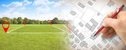 Land plot management - real estate concept with a vacant land on a green field available for building construction in a residential area against an imaginary cadastral map
