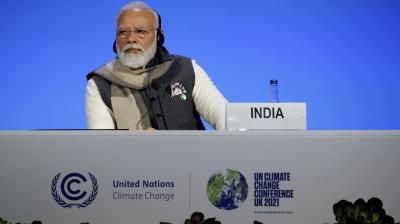 India's Prime Minister Narendra Modi attends a meeting during the UN Climate Change Conference COP26 in Glasgow. (AP)