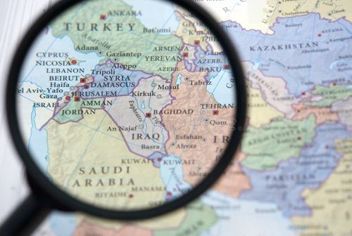 Syria and the Middle East on a map. Seen through a magnifying glass stock images