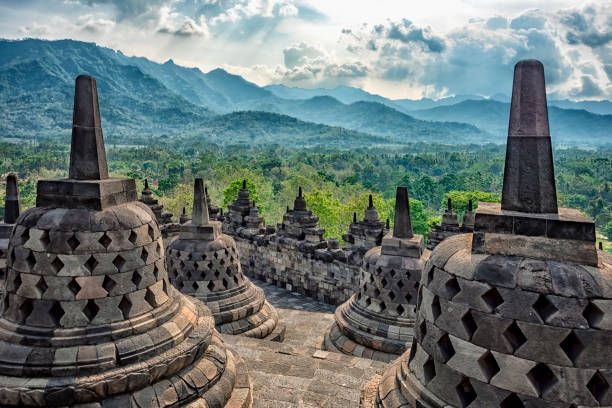 Borobudur complex in central Java, Indonesia Early morning in Borobudur temple in Java temple of the universe stock pictures, royalty-free photos & images