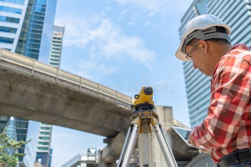 Civil engineer land survey with tacheometer or theodolite equipment. Worker Checking construction site on the road. Surveyor engineer making measuring with theodolite instrument level tool. Land picture stock images, royalty-free photos and pictures