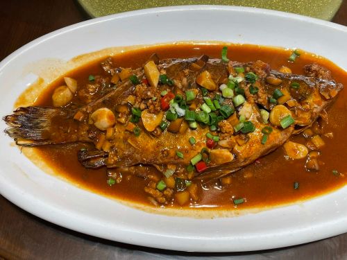 Preparation process of fermented mandarin fish