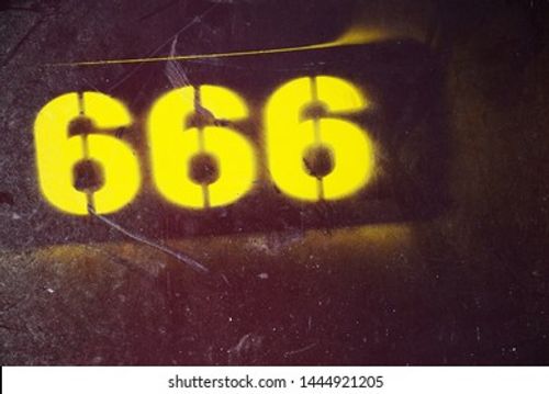 666, the number of the beast, devil's number, Christian belief, stencil paint Stock Photo