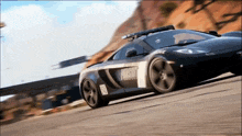 a police car is driving down the road