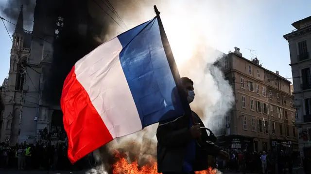 France Imposes Overnight Curfews in Parts of Paris and Nice After Riots