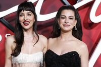 Anne Hathaway and Dakota Johnson recall ’gnawing’ on wood for ‘kinky’ Verity oral sex scene - Entertainment Weekly