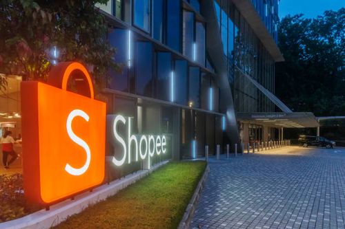 Shopee headquarters in Singapore Singapore, Singapore - 2021: A large Shopee logo at the entrance to the e-commerce platform's headquarters at Science Park. (Exact photography date unknown due to incorrect camera settings) shopee stock pictures, royalty-free photos & images