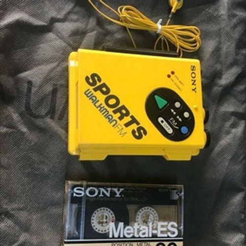 SONY WM-F5 “Sports Walkman” Cassette Player Walkman, Yellow w/ Sony Headphones and belt Clip ***  great ***
