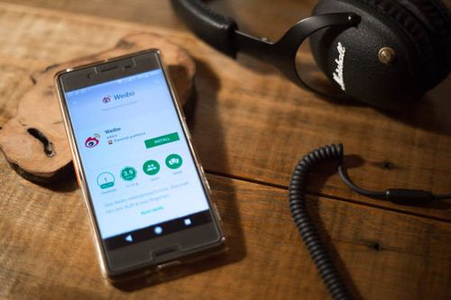 In this photo illustration, the Weibo application seen displayed via the Google Play Store on an Android Sony smartphone.