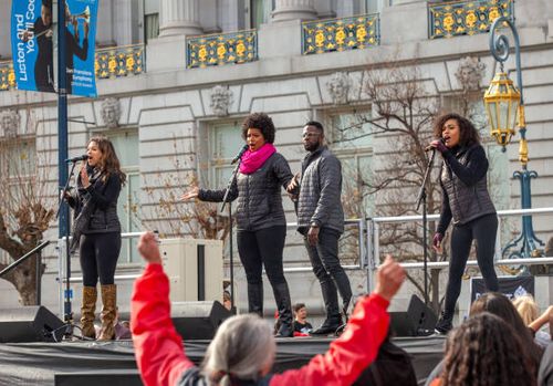 Members of the touring cast of Hamilton perform The Schuyler Sisters at the 2020 San Francisco Women's March ca. 18 January 2020.