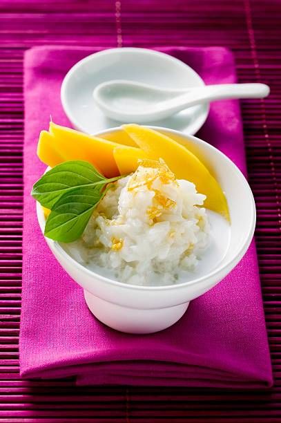 sticky rice with mango and coconut milk - mango sticky rice stock pictures, royalty-free photos & images