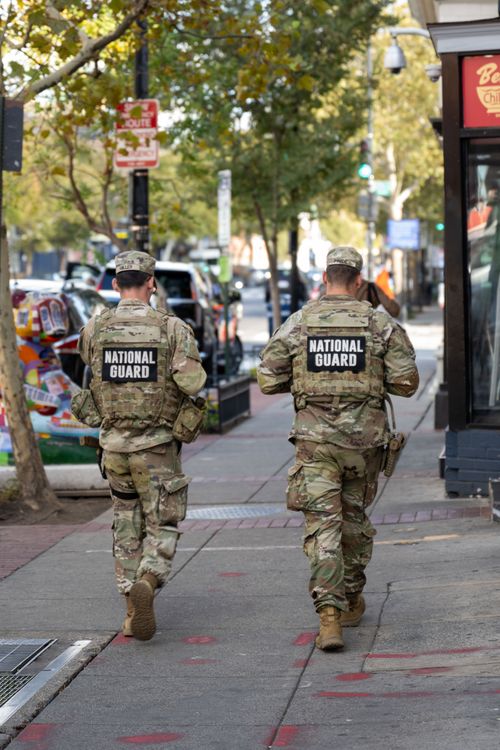 w va national guardsmen patrol u street metro station in washington d c
