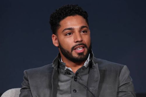 Michael Evans Behling speaks onstage at The CW presentation of "All American" during the 2024 TCA Winter Press Tour at The Langham Huntington,...
