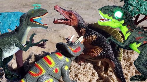 Toy dinosaurs fighting clearance