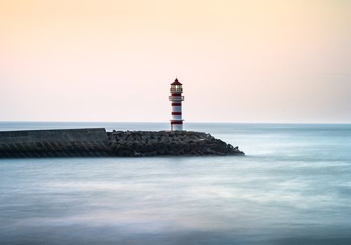 海南万宁神州半岛风景区灯塔夕阳晚霞图片下载
