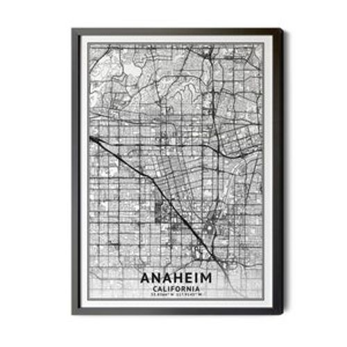 May include: A black and white map of Anaheim, California, in a black frame. The map shows the streets and roads of the city. The text 'ANAHEIM CALIFORNIA 33.8164° N 117.9143° W' is printed at the bottom of the map.