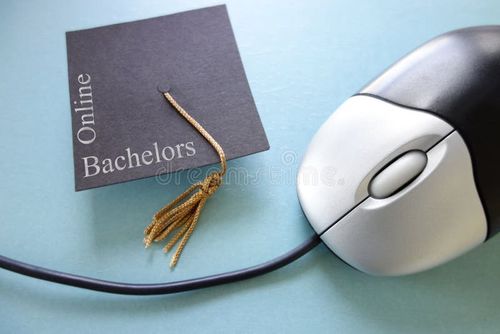 Computer mouse and Online Bachelors grad cap. Bachelors degree stock images, royalty-free photos and pictures