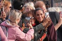 Prince Harry and Meghan cheered as they make first joint appearances since returning to UK - AP News