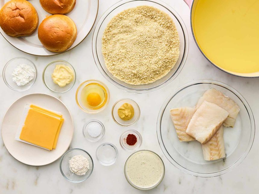 All ingredients to make copycat filet o' fish sandwiches gathered on a kitchen counter.