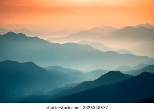 Amazing nature scenery, mountains under morning mist Stock Photo