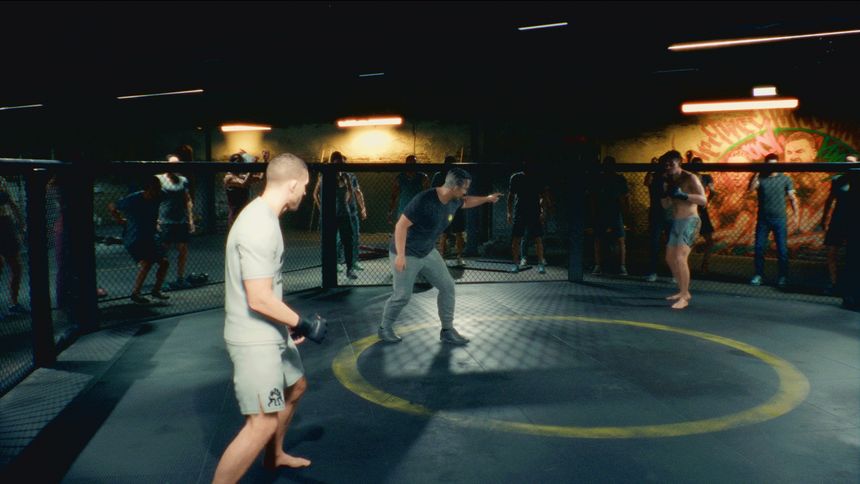 Two characters spar inside an octagon as onlookers watch from the cage perimeter.