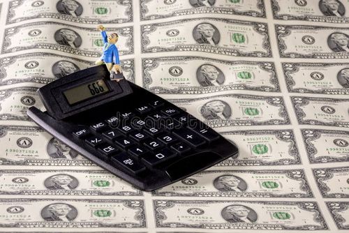 Calculator with the number 666 and money with a toy man. Number 666 stock images, royalty-free photos and pictures