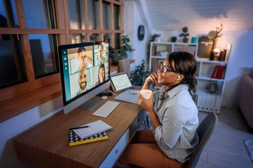 young beautiful smiling businesswoman having video call while working from home office - hybrid work stock pictures, royalty-free photos & images
