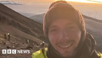 Northampton man scales Mount Kilimanjaro walking backwards - BBC News