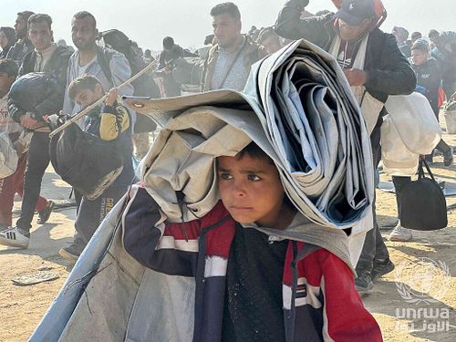 return of displaced people via al rasheed street after ceasefire january 2025 gaza strip