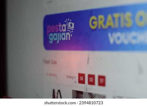 pringsewu, Lampung; November 30, 2023; Lazada Indonesia application on a computer monitor. "Pesta Gajian" program for free vouchers, online shopping website. selective focus Editorial Stock Photo