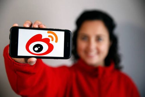 In this photo illustration, the Weibo logo is displayed on the screen of an iPhone on November 25, 2019 in Paris, France. Weibo is a Chinese...