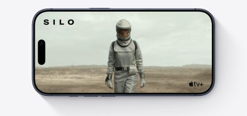 iPhone front exterior, horizontal, Apple TV clip of person in spacesuit, Silo