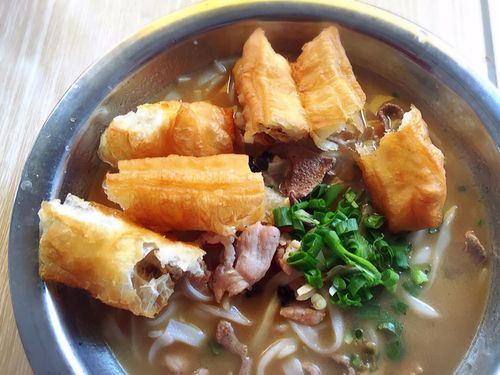 Bustling Nanning street market with food stalls