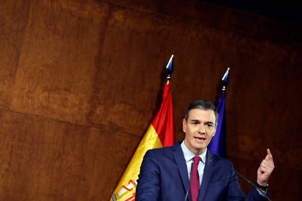 Spain's acting Prime Minister and Secretary General of the Socialist Party Pedro Sanchez speaks after signing an agreement to form a coalition...