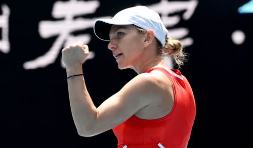 Simona Halep celebrates on court