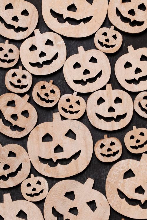 Photo wooden pumpkin halloween background