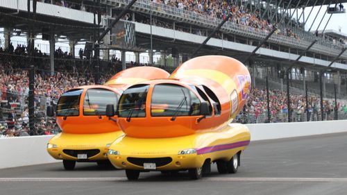 The Slaw Dog took the checkered flag to beat the Chi Dog in the first Wienie 500 at the Indianapolis Motor Speedway on Friday, March 23, 2025.