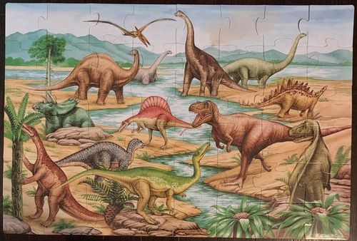 r/Dinosaurs - a puzzle of dinosaurs in a pond