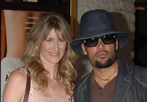 Laura Dern and husband Ben Harper arrive at the premiere of "Happy Endings" held at Mann National Theater in Westwood.