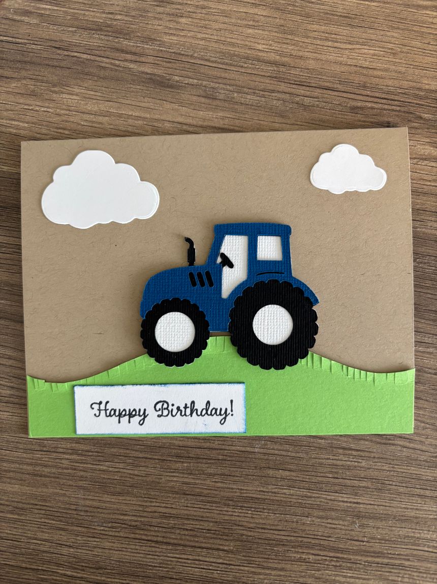 a birthday card with a tractor on it