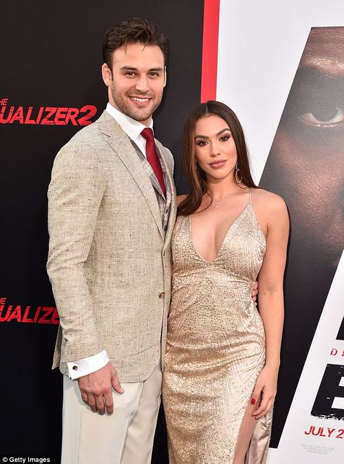 Hardly showing: Ryan Guzman and Chrysti Ane on the red carpet at the premiere of The Equalizer 2 in Hollywood in July