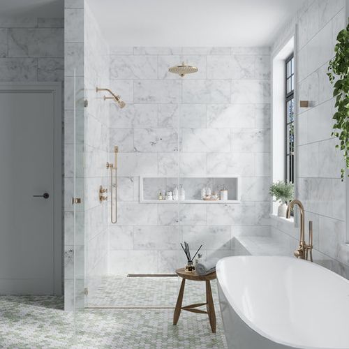 White Bianco Carrara honed marble 12x24 subway tile on shower walls and bathroom floor