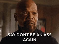 a bald man with a beard says say dont be an ass again