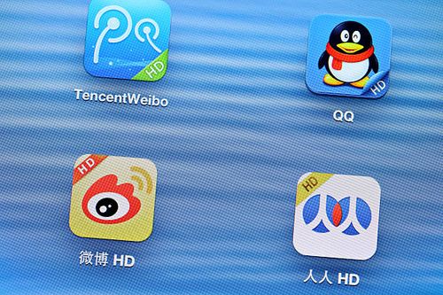 China social media mobile application on tablet Hong Kong , Hong Kong - April 18, 2013: China social media mobile application with tencentweibo, QQ and weibo on the tablet weibo photos stock pictures, royalty-free photos & images