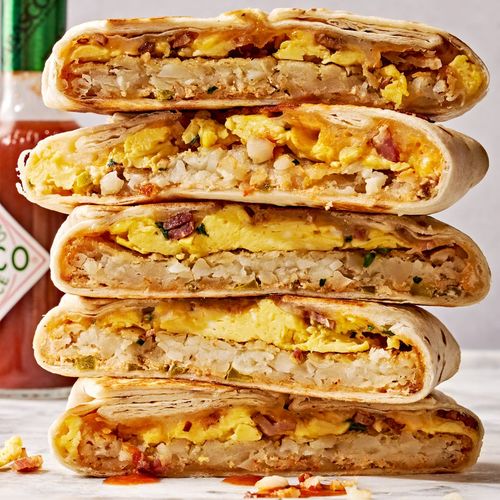 crunchwrap layered with eggs, hashbrowns, and bacon