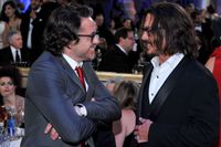 Johnny Depp deletes photoshopped image of himself with Robert Downey Jr. after Oscars