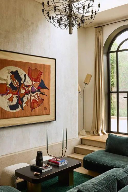 Chic arched windows illuminate a stylish modern 70s living room.